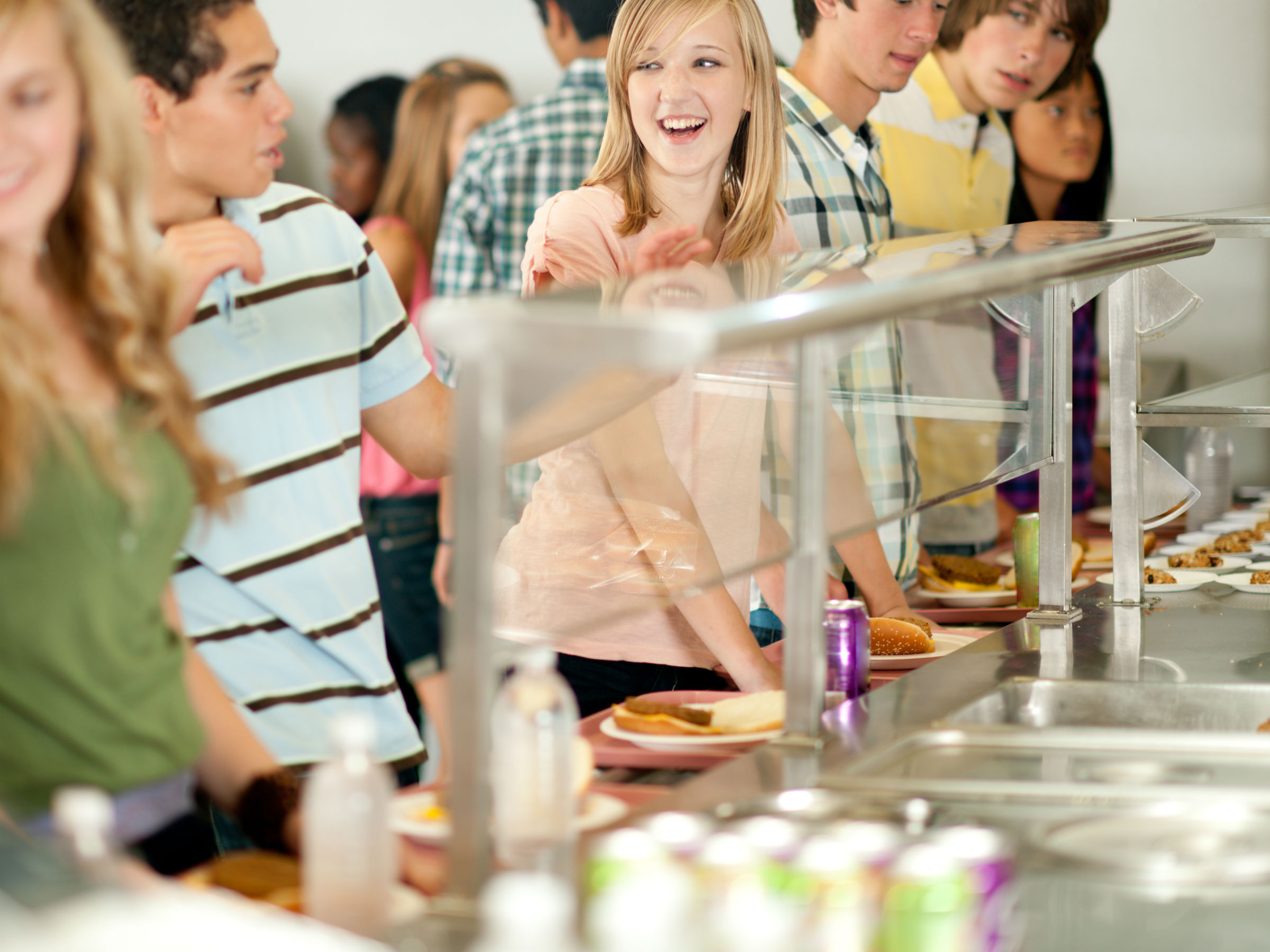 Students waiting in line in cafeteria