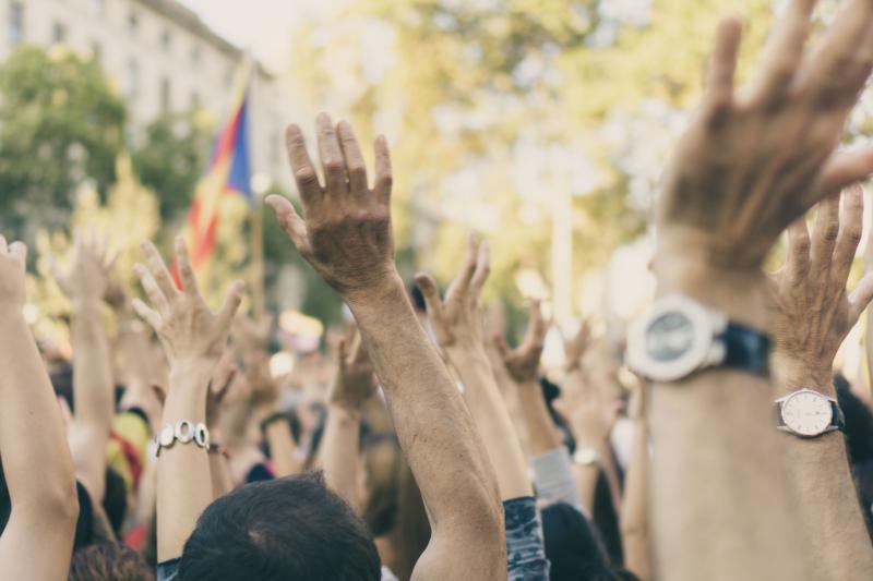 Hands raised in protest