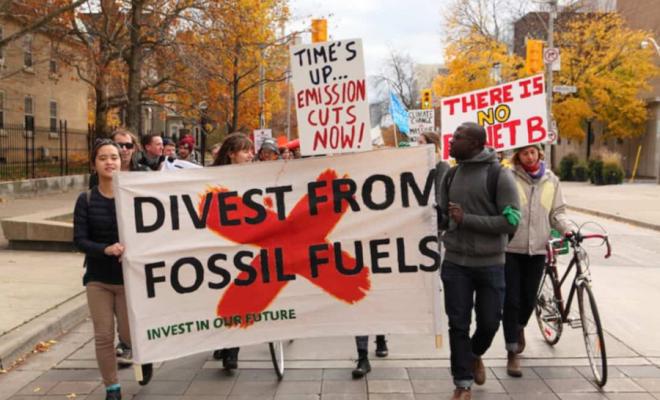 Divestment - image of banner saying Divest from Fossil Fuels