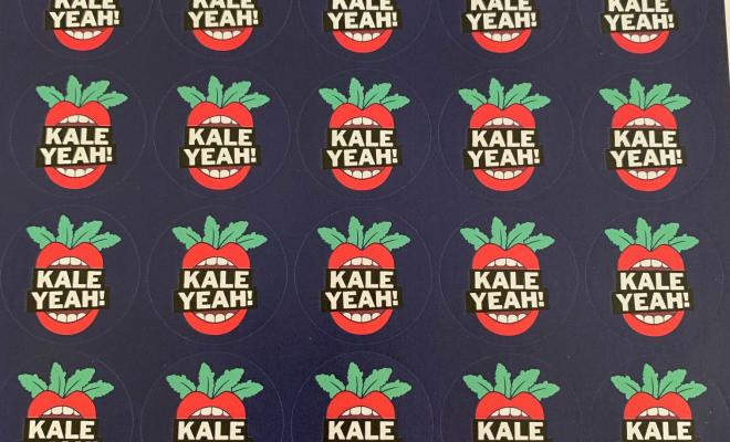 A sheet of small, round Kale Yeah! stickers