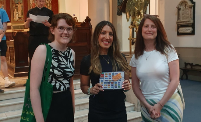 Three people smiling for a photo